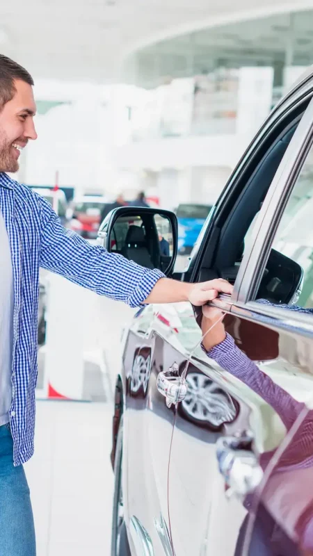happy-man-car-dealership